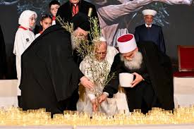 El gesto religioso de plantar un olivo